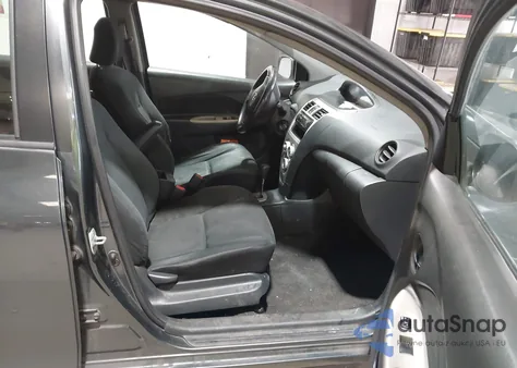 2010 Toyota Yaris из США, поврежденный, VIN JTDBT4K39A1359843